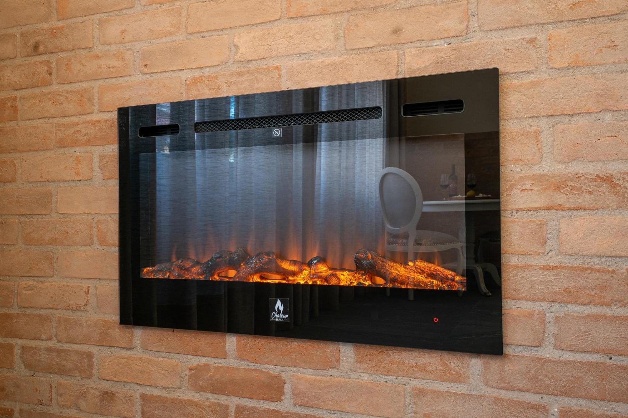 Pousada Luis XV Campos do Jordao Exterior photo A wall mounted electric fireplace