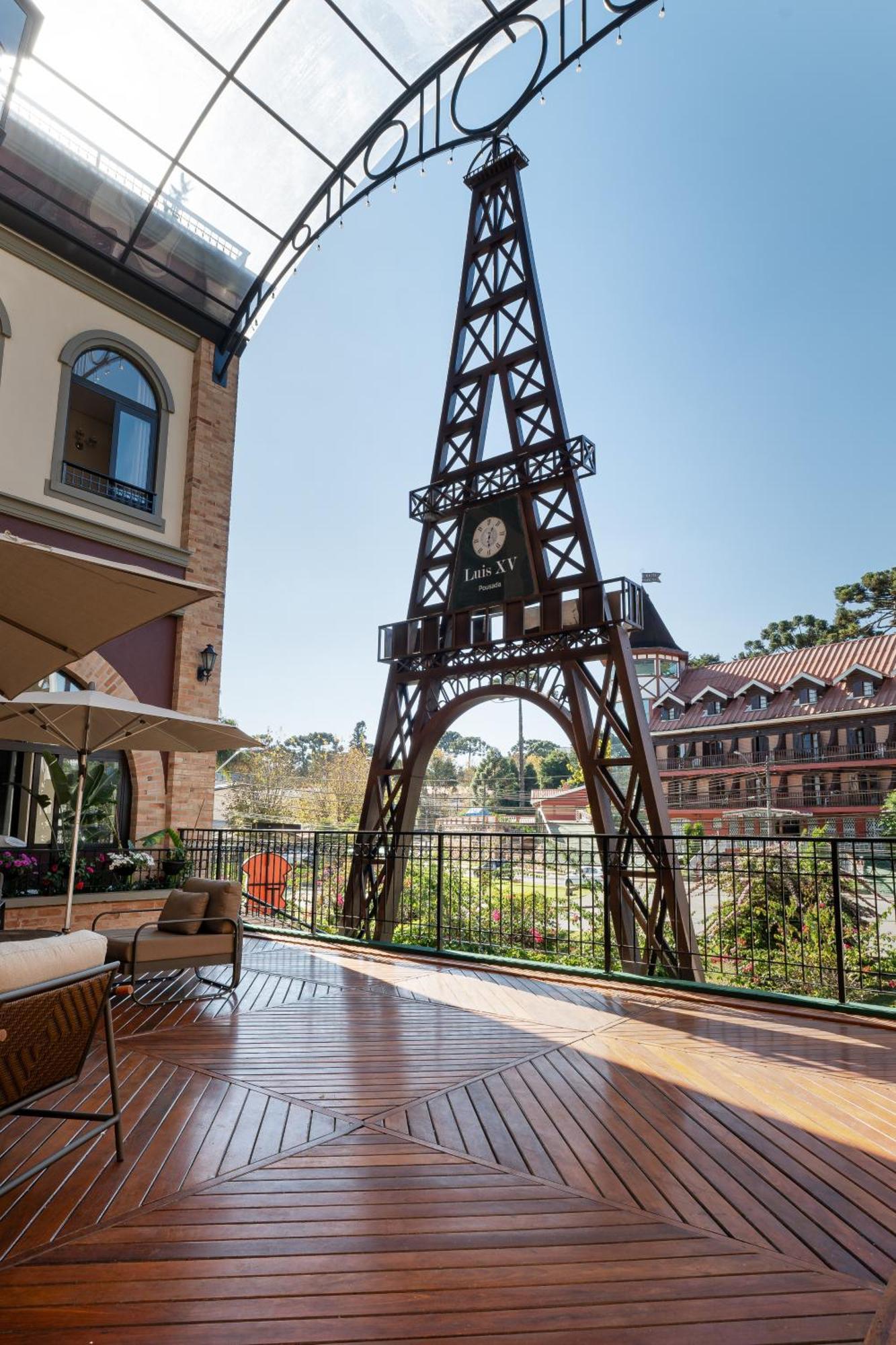 Pousada Luis XV Campos do Jordao Exterior photo The Eiffel Tower at the French village